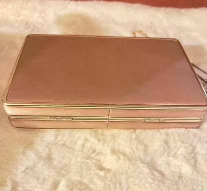 Preloved BCBGmaxazaria  clutch in peach